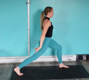 Dr. Chloe in a standing lunge improving her toe flexibility